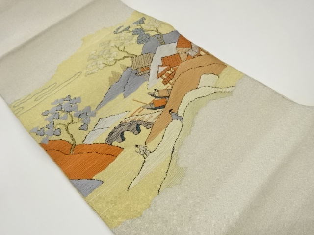 山々に民家・人々模様織出し名古屋帯